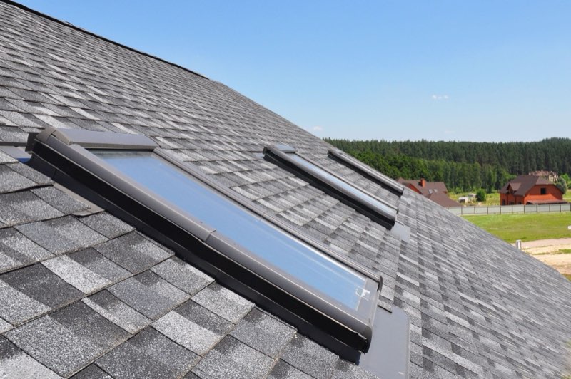 Architectural asphalt and standing seam metal roofing comparison
