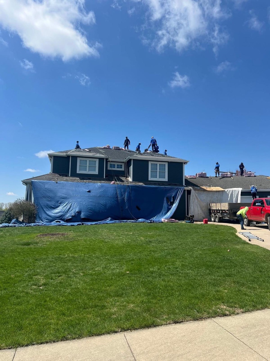 Bakeris Roofing crew working on a roof